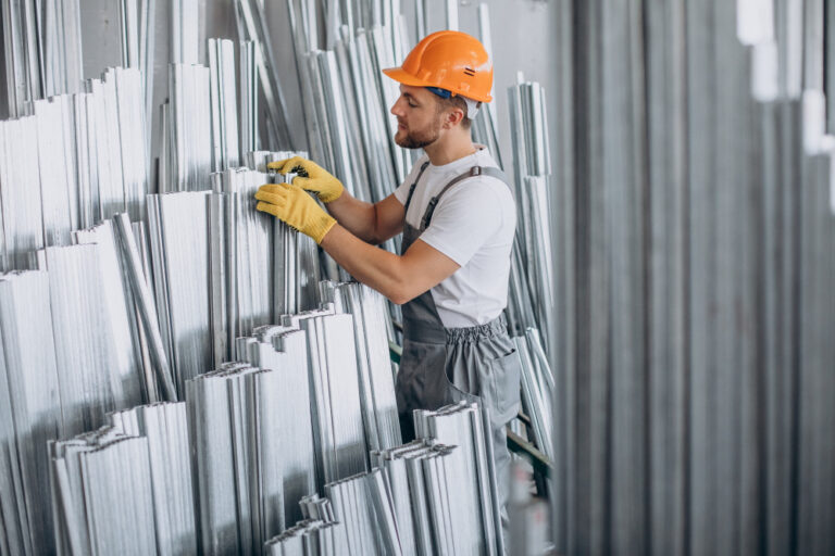 A picture of a guy in roofing sheet go down