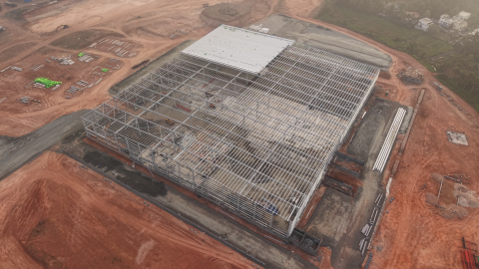 Logistics company PEB warehouse with column-free storage and loading docks